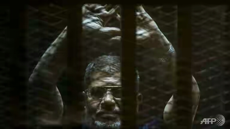 Egypt court quashes one of Morsi life sentences: Lawyer