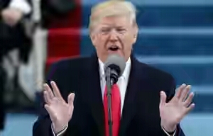 President Donald Trump signs first bill into law