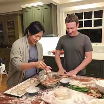 Mark Zukerberg pictured cooking with his wife