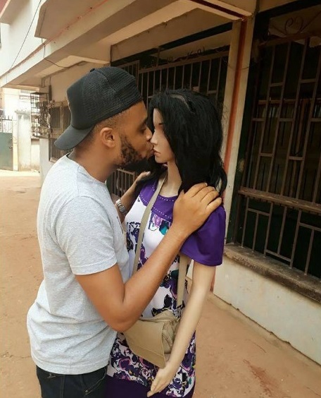 Nigerian man kneels to propose to his mannequin sex doll